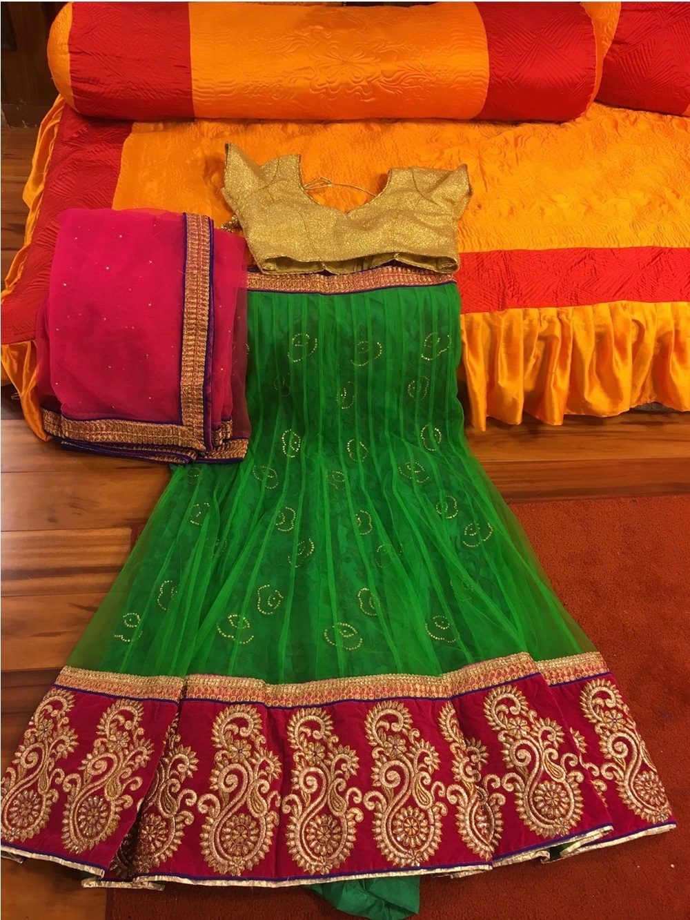 Embroidered Green and Pink Wedding Lehenga with Gold Blouse